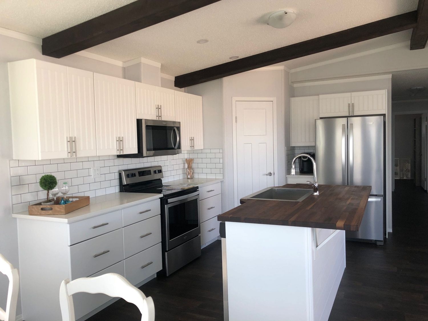 Kitchen from a Prefab and Modular Houses project near Calgary by Pleasant Homes