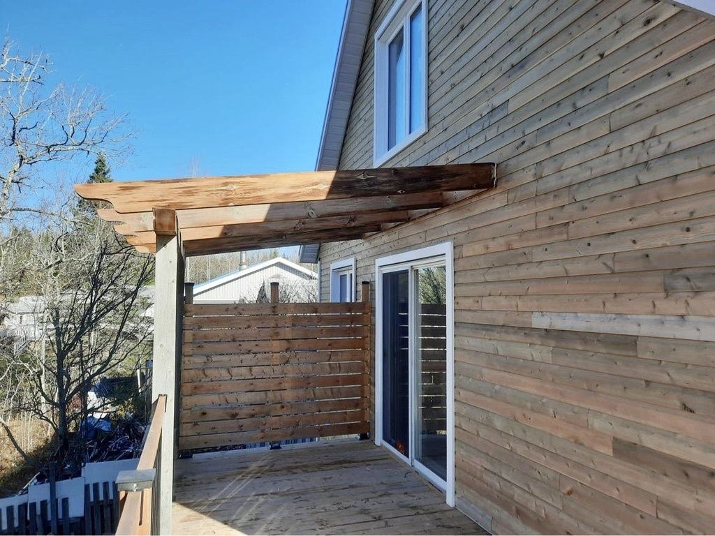 Exterior Finishes from a Single family homes project near Rimouski (Bas-Saint-Laurent) by La Couverte Construction Communautaire
