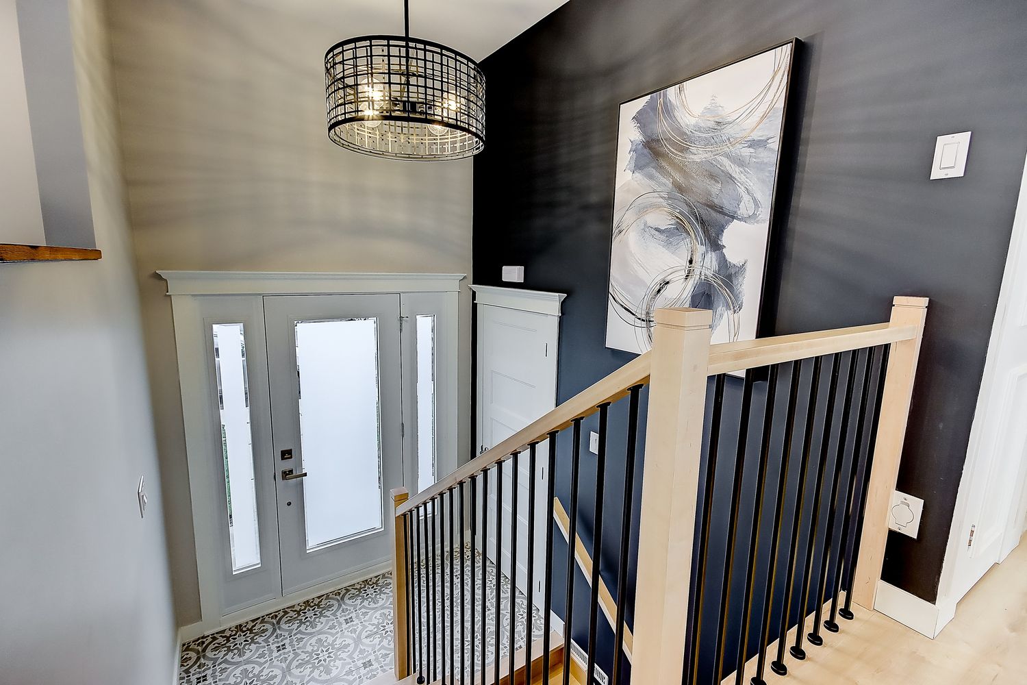 Hall d’entrée d'un projet de Maisons unifamiliales près de Saint-Jean-sur-Richelieu (Montérégie) de Mandrée Design