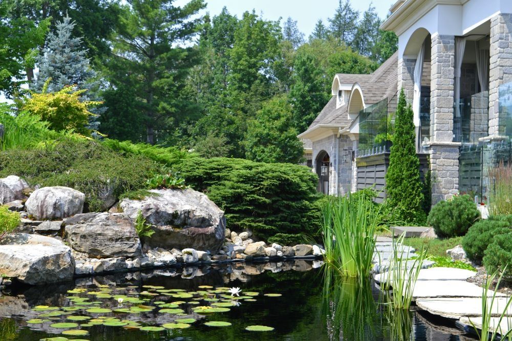 Pool & Natural Pond from a Garden ponds project near Quebec City - Levis by Repères