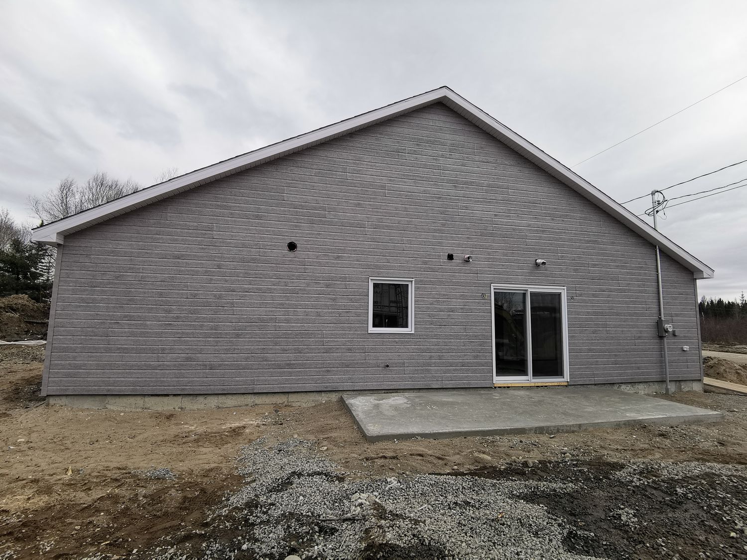 Acabado exterior de un proyecto de tipo Viviendas unifamiliares cerca de Saguenay - Lac-Saint-Jean por Solutions Expert SSS