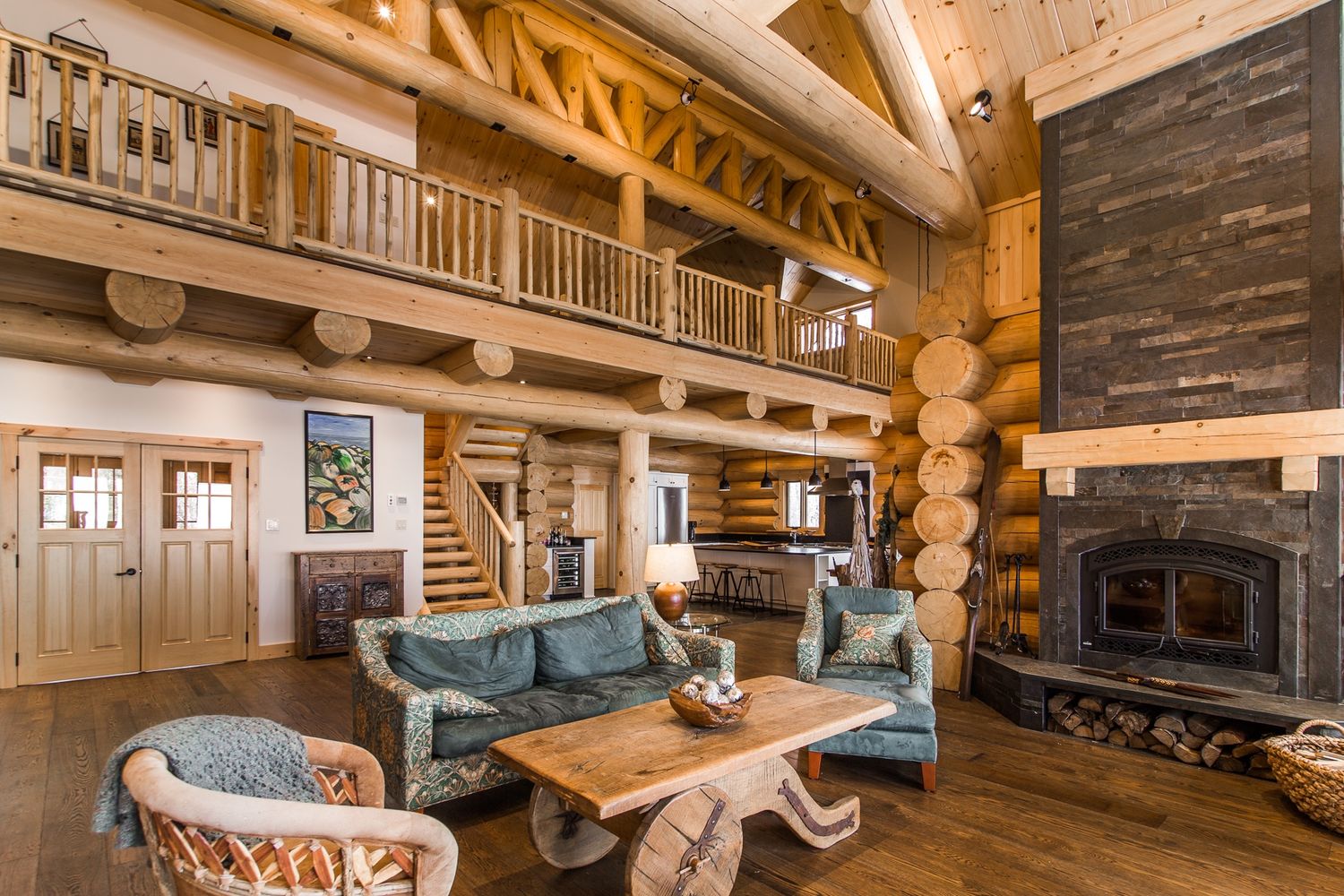 Living Room from a Log Houses project near Montreal (Greater Montreal) by Harkins inc. - Bois rond & Charpenterie