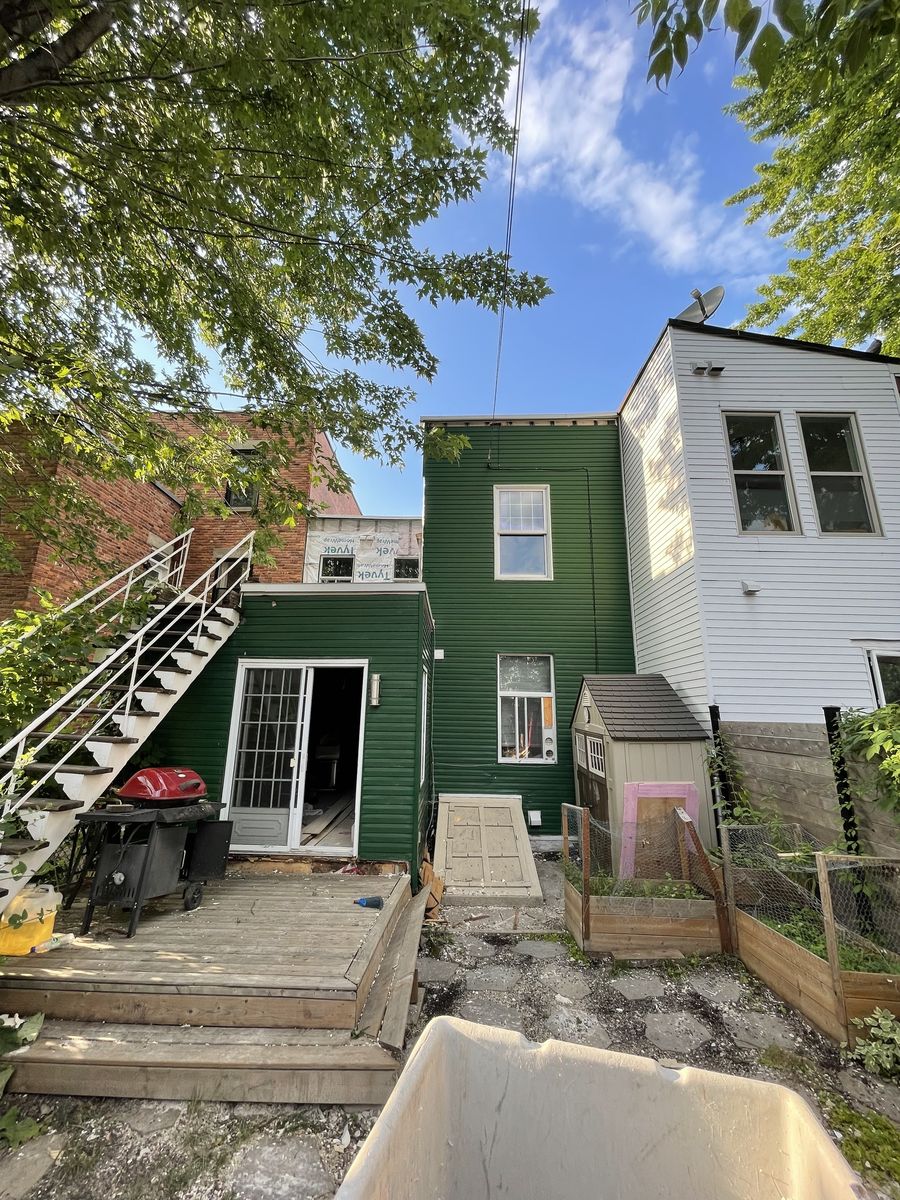 Backyard from a Multi-family and high-rise Buildings project near Montreal (Greater Montreal) by Retrofit Construction
