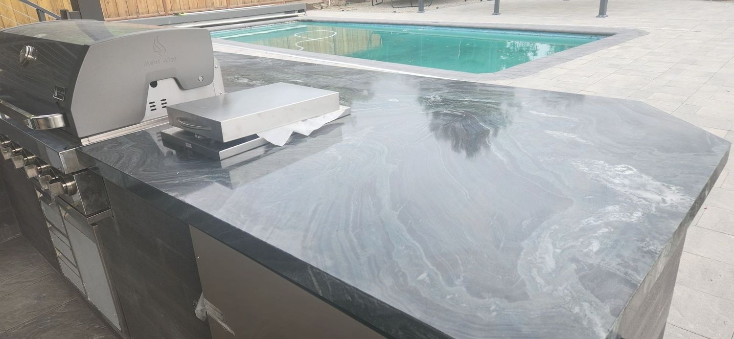Backyard from a Outdoor Kitchens project near San Francisco Bay by Contractors Central