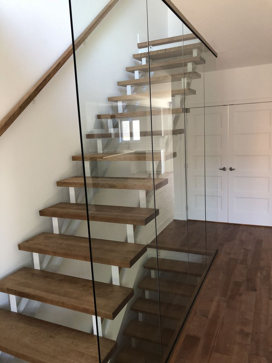 Staircase from a Home extensions project near Montreal (Greater Montreal) by Les Constructions du Patrimoine J.S. INC.