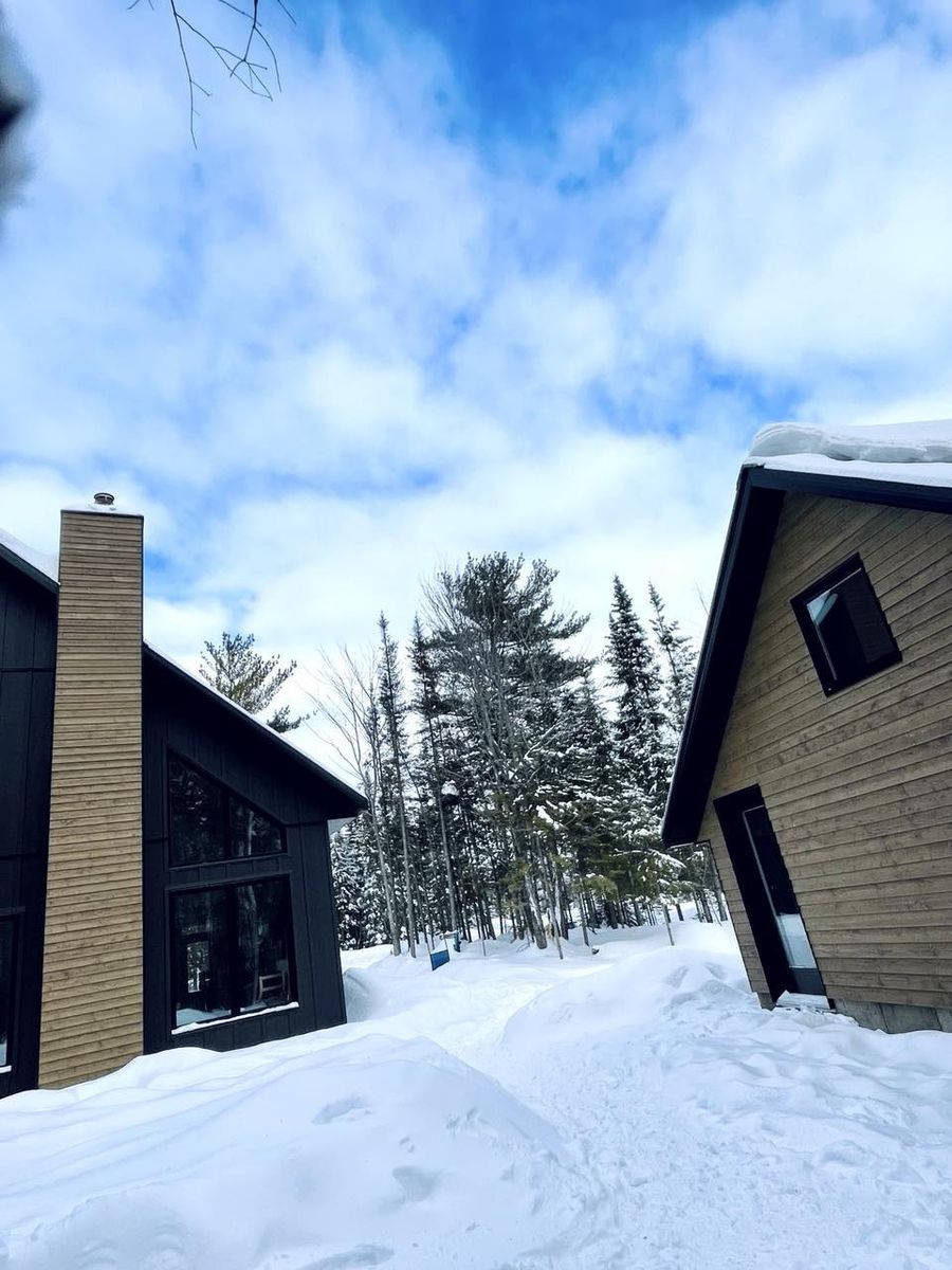 Façade avant d'un projet de Maisons unifamiliales près de Rimouski (Bas-Saint-Laurent) de ORIGINE Écoconstruction inc.