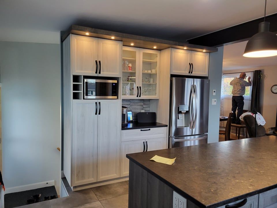 Cocina de un proyecto de tipo Cocinas cerca de Ciudad de Quebec - Lévis por Concept Construction