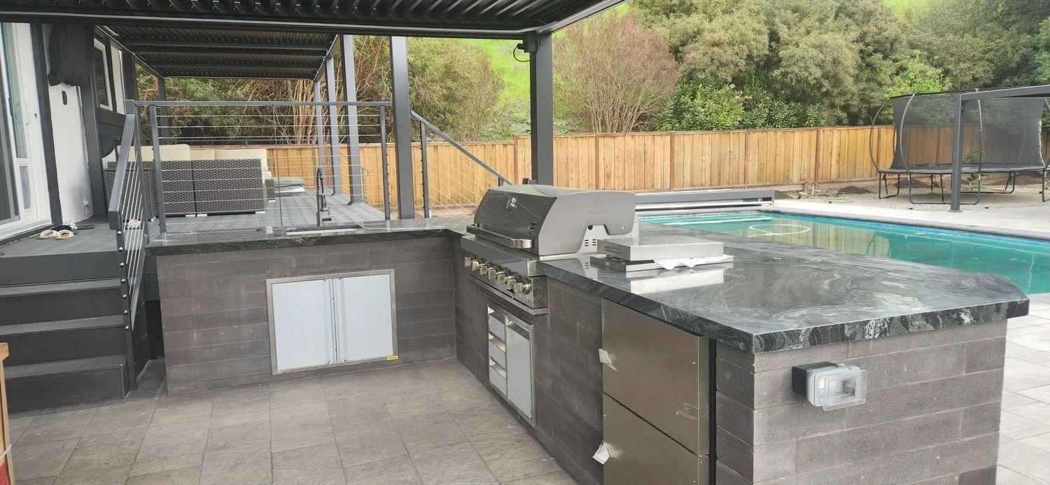 Backyard from a Outdoor Kitchens project near San Francisco Bay by Contractors Central