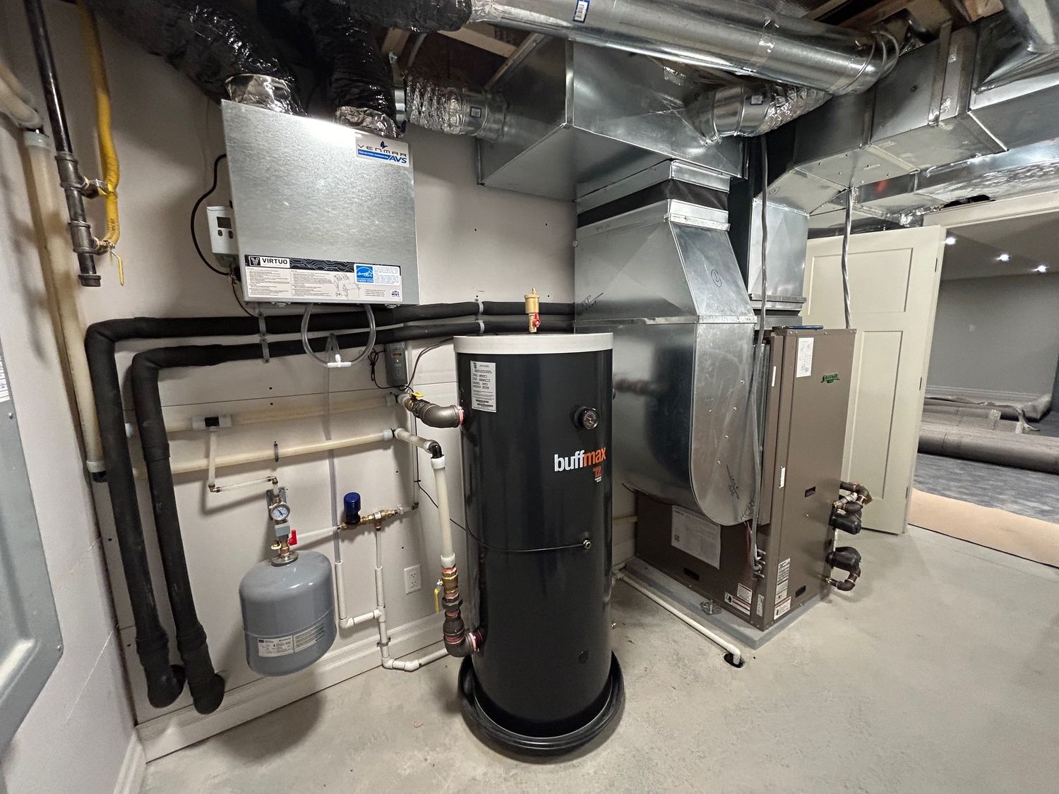 Salle mécanique d'un projet de Systèmes géothermiques près de Montréal/Laval/Longueuil (Grand Montréal) de PCP Ventilation