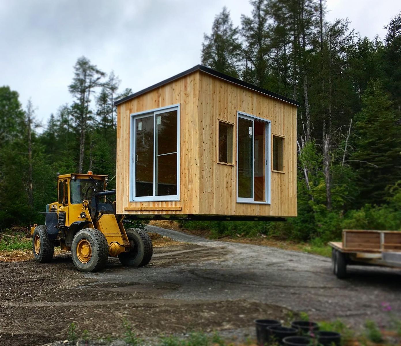Construcción de exteriores de casas de un proyecto de tipo Mini casas cerca de Rimouski (Bas-Saint-Laurent) por CAMM Construction