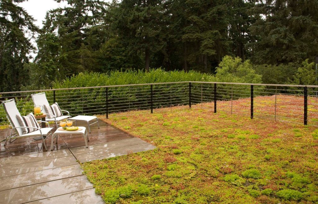 Terraza en la azotea de un proyecto de tipo Viviendas unifamiliares cerca de Spokane por Coates Design Inc.