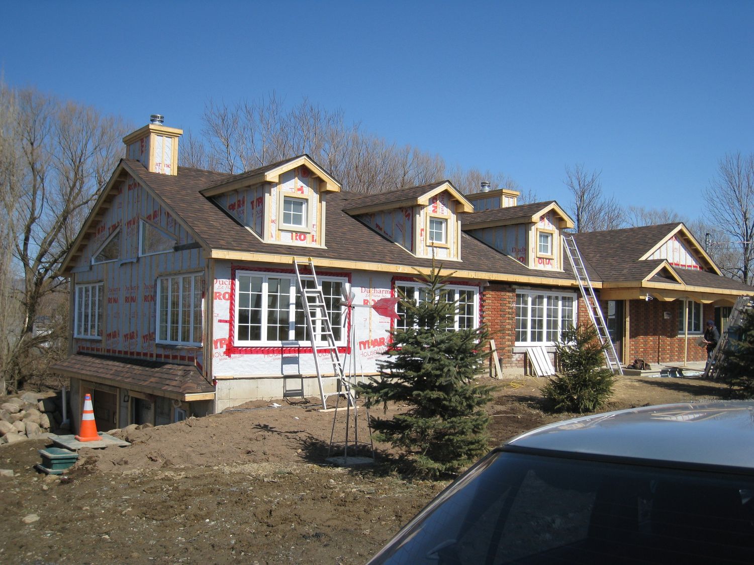 Construcción de exteriores de casas de un proyecto de tipo Casas Prefabricadas y modulares cerca de Montreal (Gran Montreal) por CAD Concept Consultants