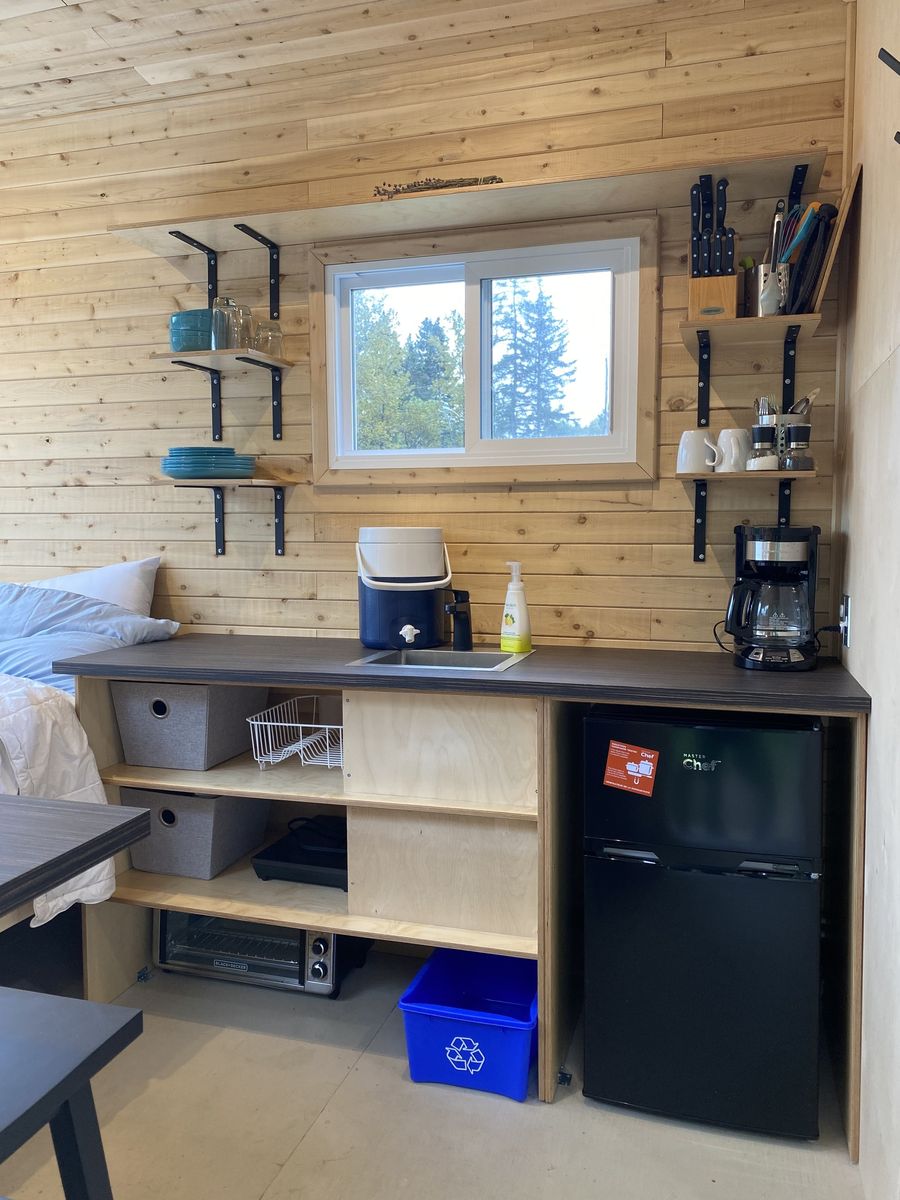 Kitchen from a Tiny Houses project near Rimouski (Bas-Saint-Laurent) by CAMM Construction