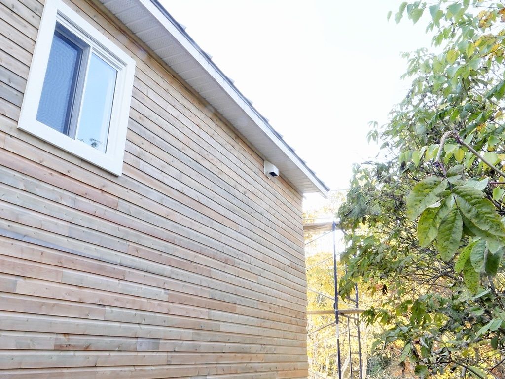 Exterior Finishes from a Single family homes project near Rimouski (Bas-Saint-Laurent) by La Couverte Construction Communautaire