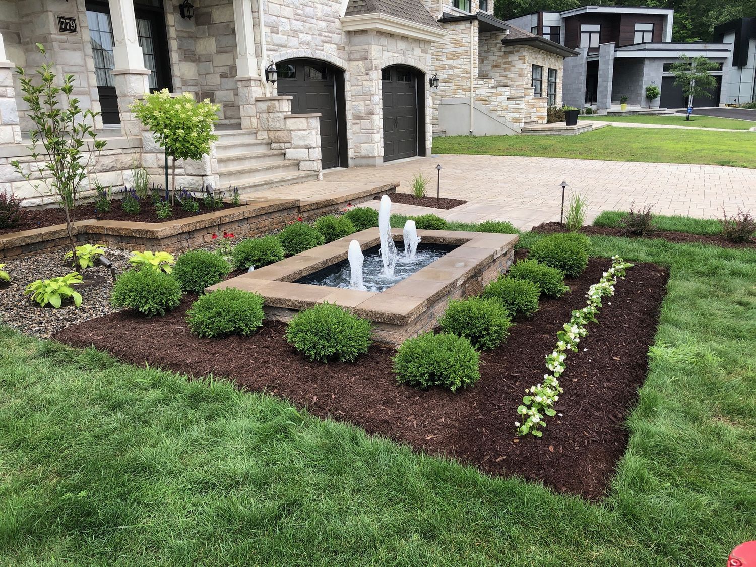 Front Yard from a Garden ponds project near Montreal (Greater Montreal) by Courchesne Architecte Paysagiste