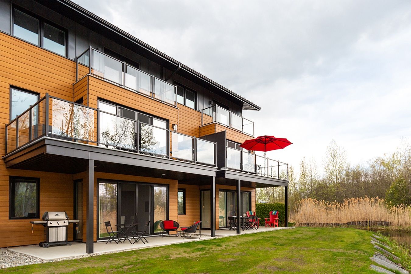 Backyard from a Multi-family and high-rise Buildings project near Sherbrooke (Estrie) by Studio MMA Architects