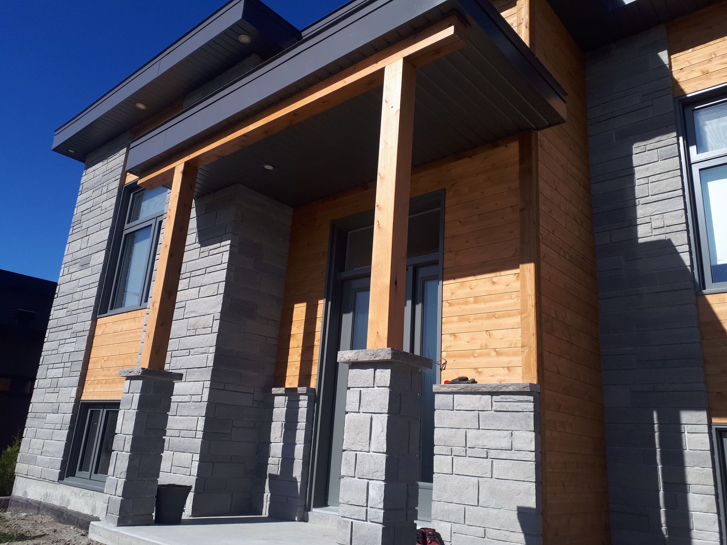 Porch from a Single family homes project near Quebec City - Levis by Concept Construction