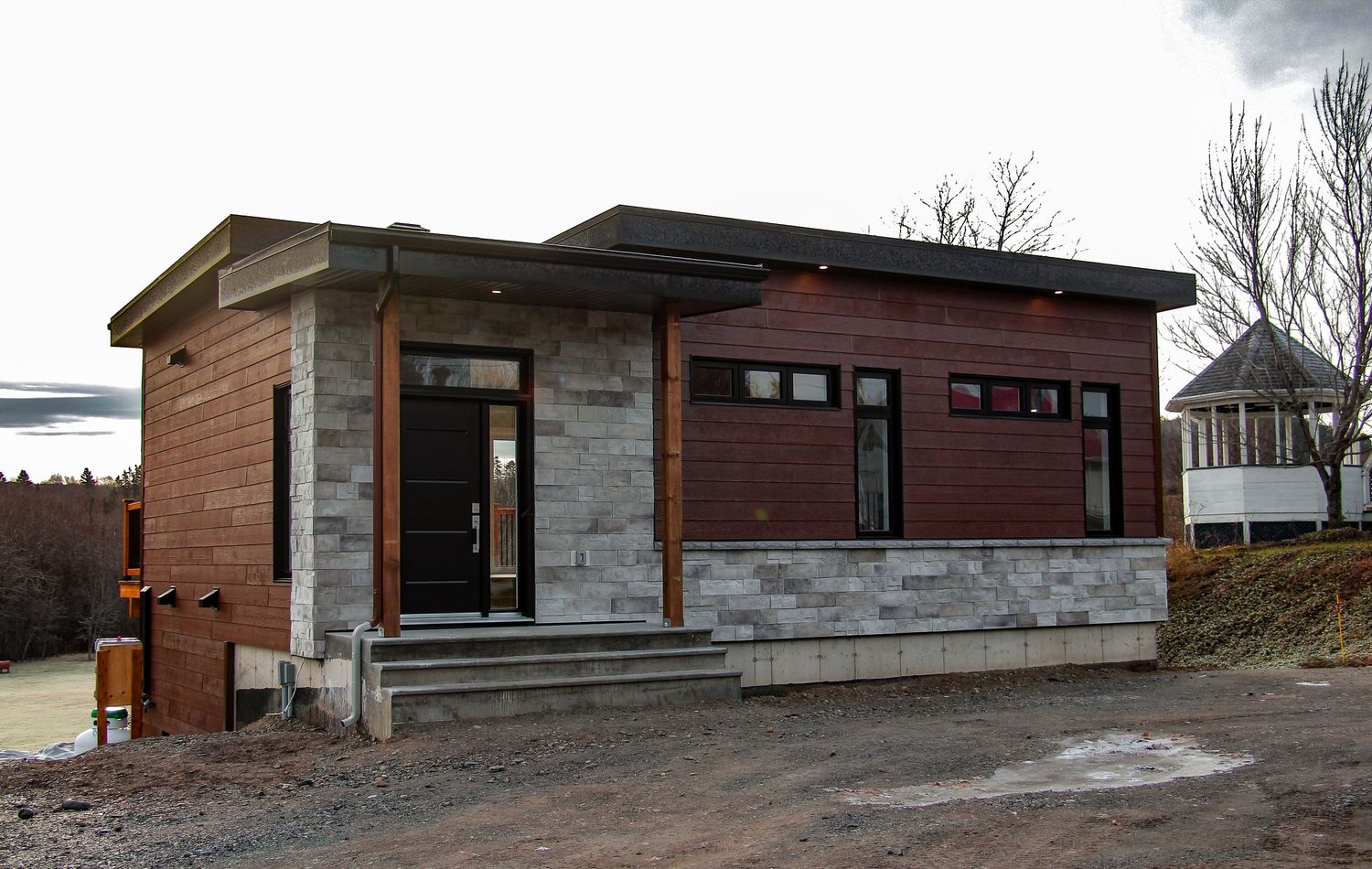 Backyard from a Single family homes project near Rimouski (Bas-Saint-Laurent) by Construction Norac