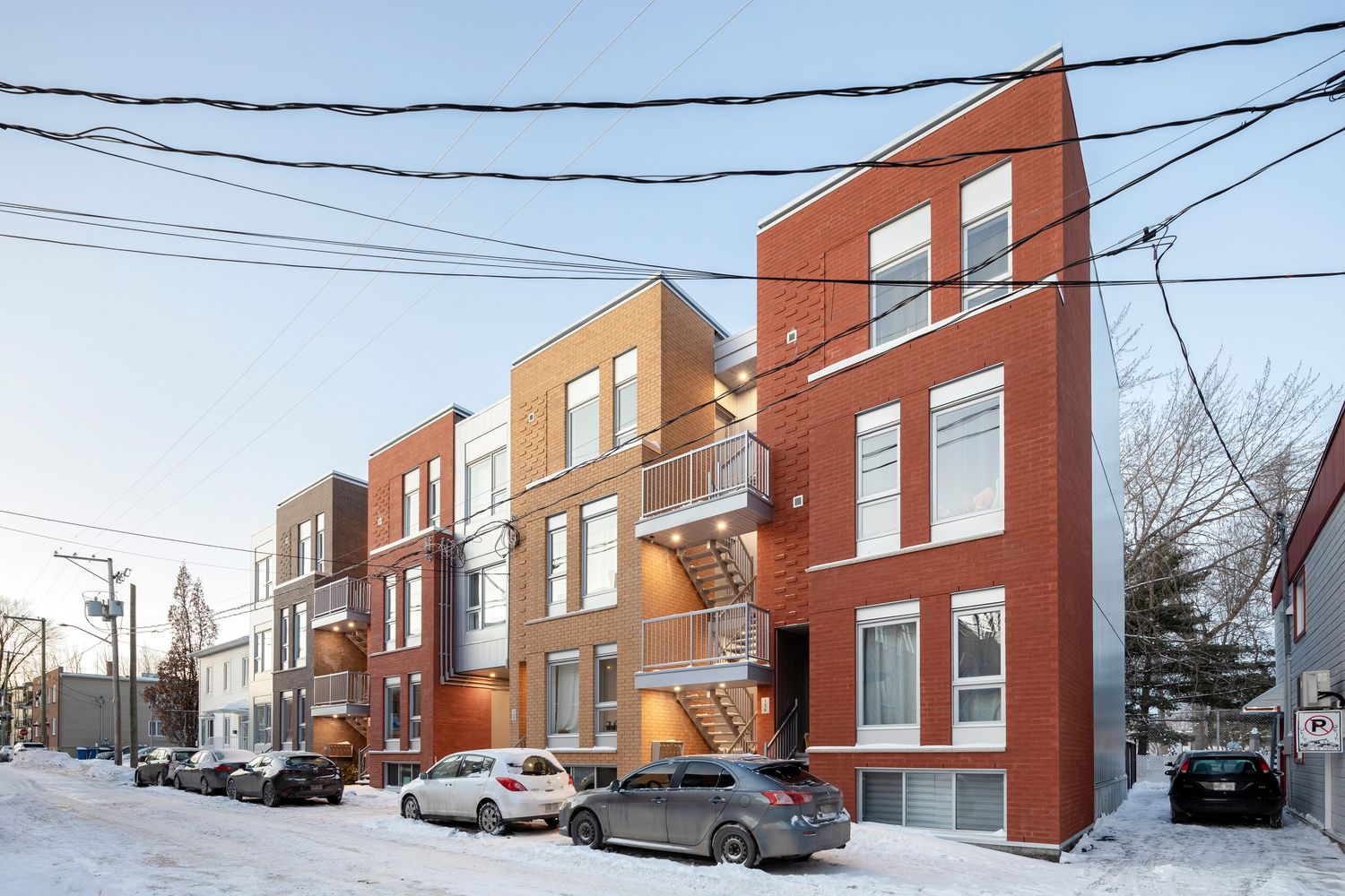 House Exterior from a Multi-family and high-rise Buildings project near Quebec City - Levis by Quinzhee Architecture