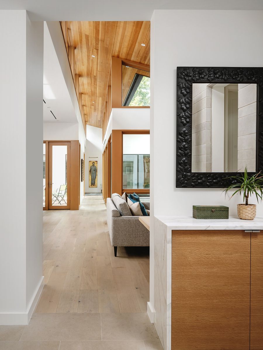 Hall from a Single family homes project near Austin by Clark Richardson Architects