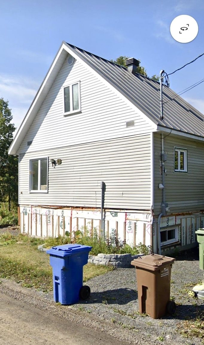 Exterior Finishes from a Single family homes project near Rimouski (Bas-Saint-Laurent) by La Couverte Construction Communautaire