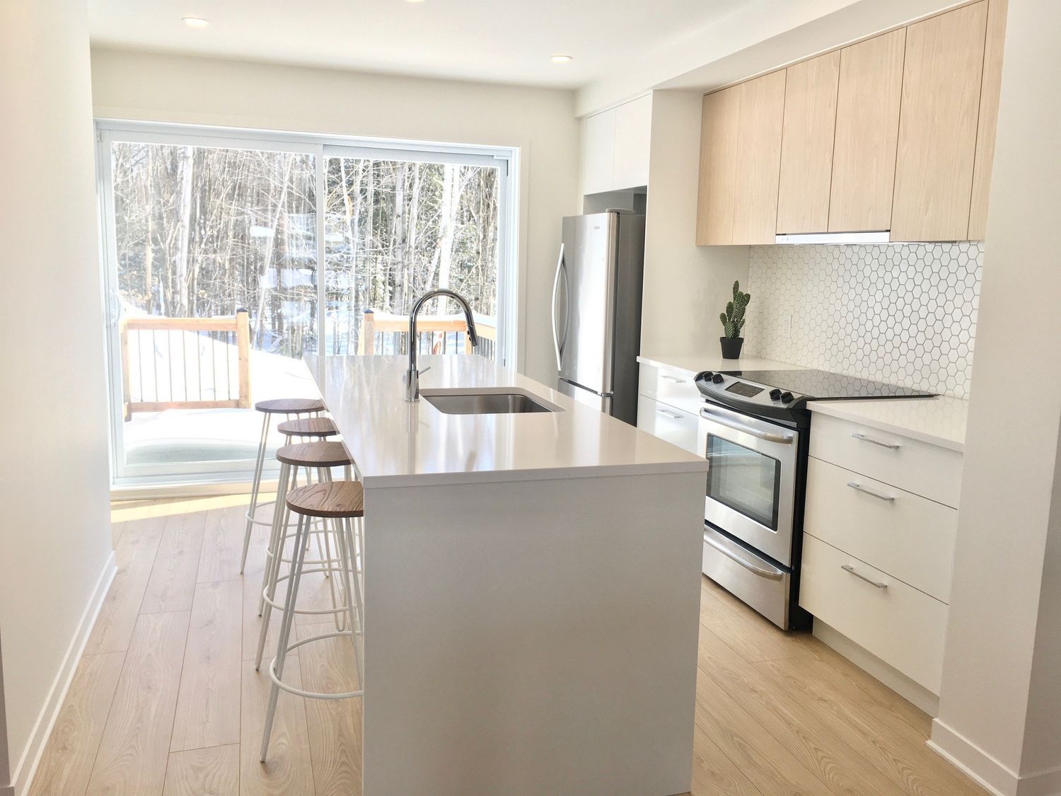 Kitchen from a Real Estate Developments project near Saint-Jerome (Laurentides) by TRÉMÄ