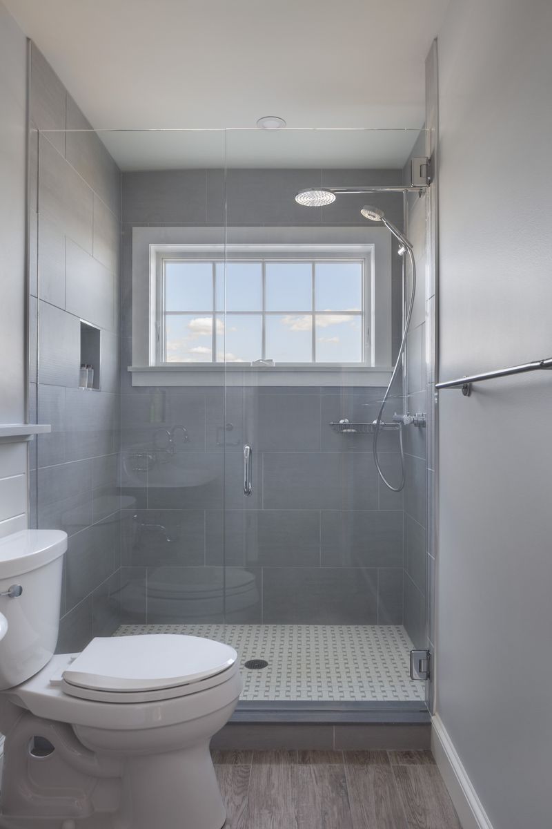 Baño completo de un proyecto de tipo Viviendas unifamiliares cerca de Portland por By Design