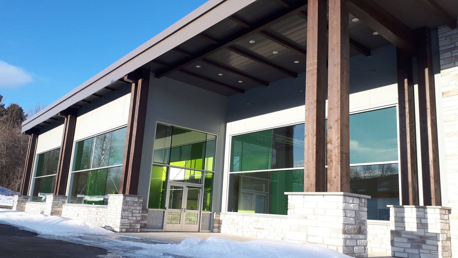 House Construction Exteriors from a Glulam Structures project near Saint-Jerome (Laurentides) by Ambiance Bois Structure