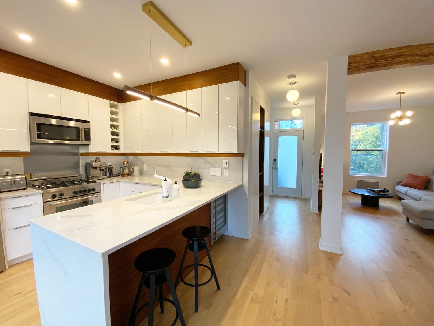 Cocina de un proyecto de tipo Ampliaciones del hogar cerca de Montreal (Gran Montreal) por psb Inc.