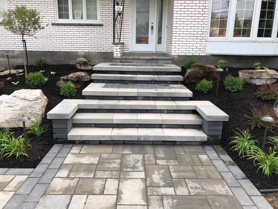 Front Yard from a Retaining walls project near Montreal (Greater Montreal) by Courchesne Architecte Paysagiste