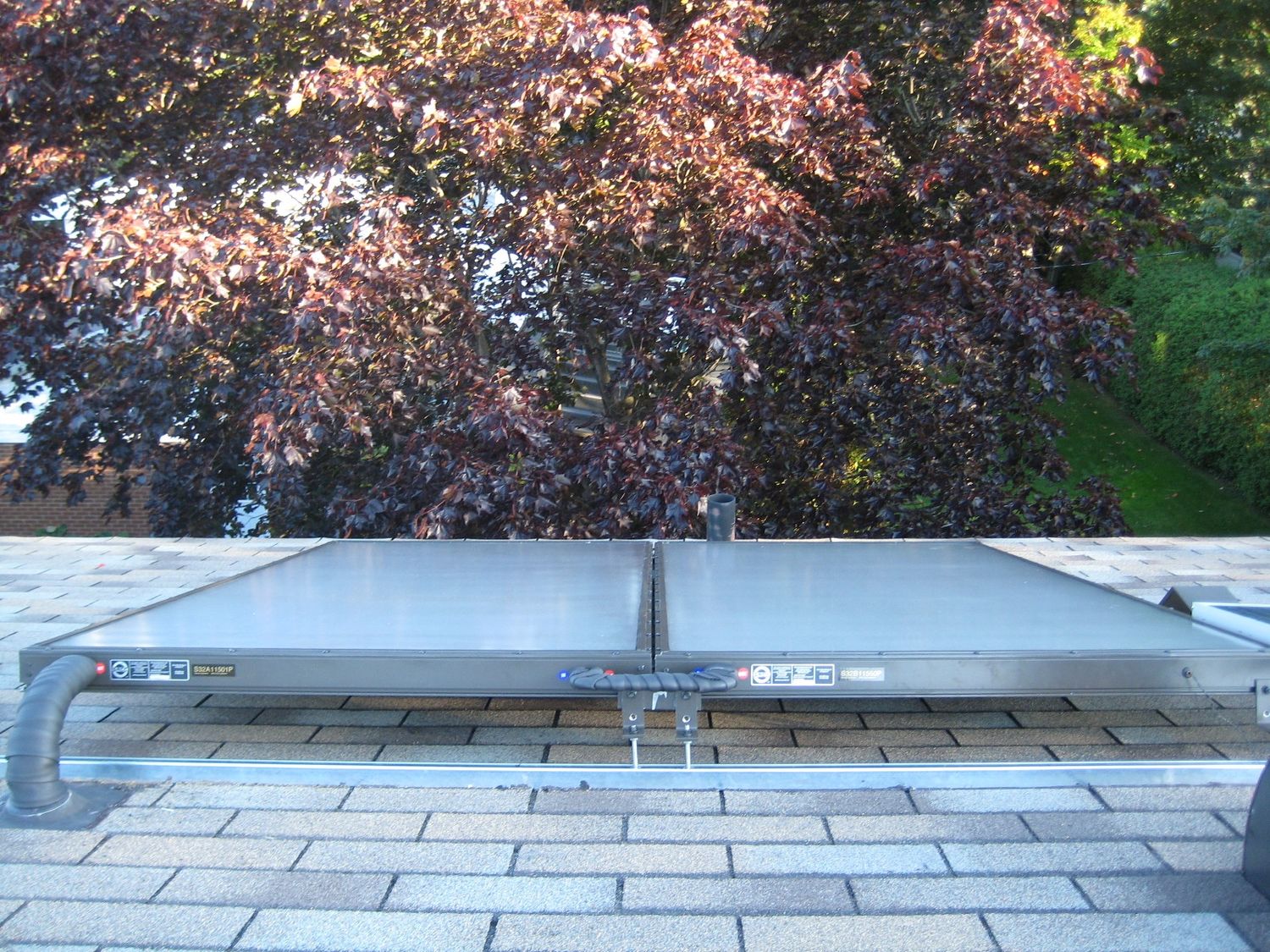 Exterior Finishes from a Solar thermal collectors project near Trois-Rivières (Mauricie) by Guillemette Energies