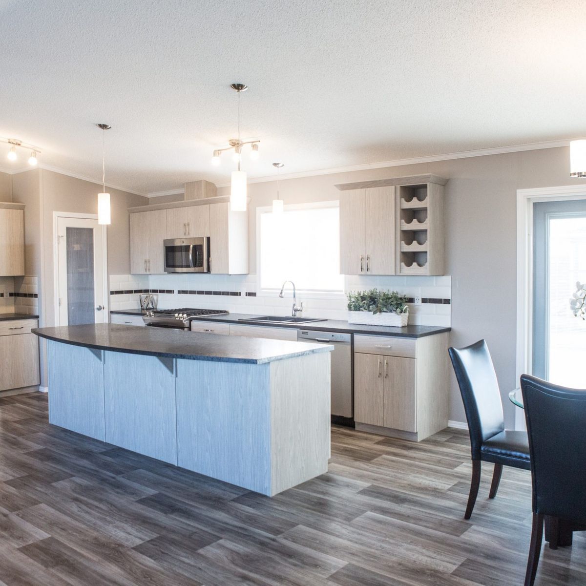 Kitchen from a Prefab and Modular Houses project near Edmonton by Jandel Homes