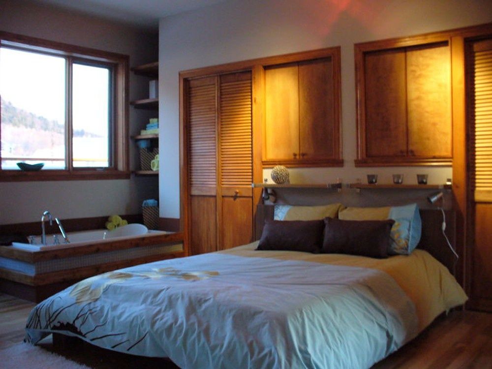 Dormitorio de un proyecto de tipo Viviendas unifamiliares cerca de Montreal (Gran Montreal) por Studioarch