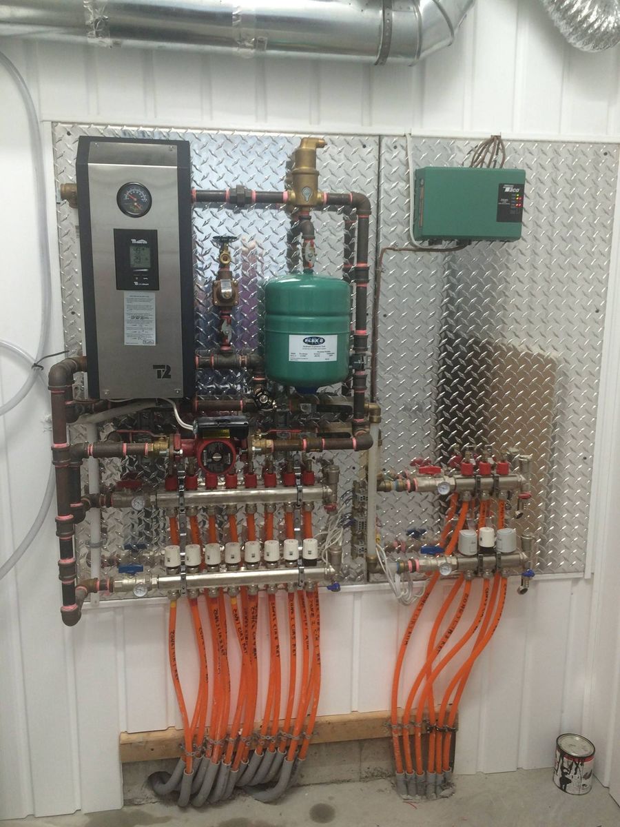 Building mechanicals from a Hydronic Radiant Floor Heating project near Trois-Rivières (Mauricie) by Guillemette Energies