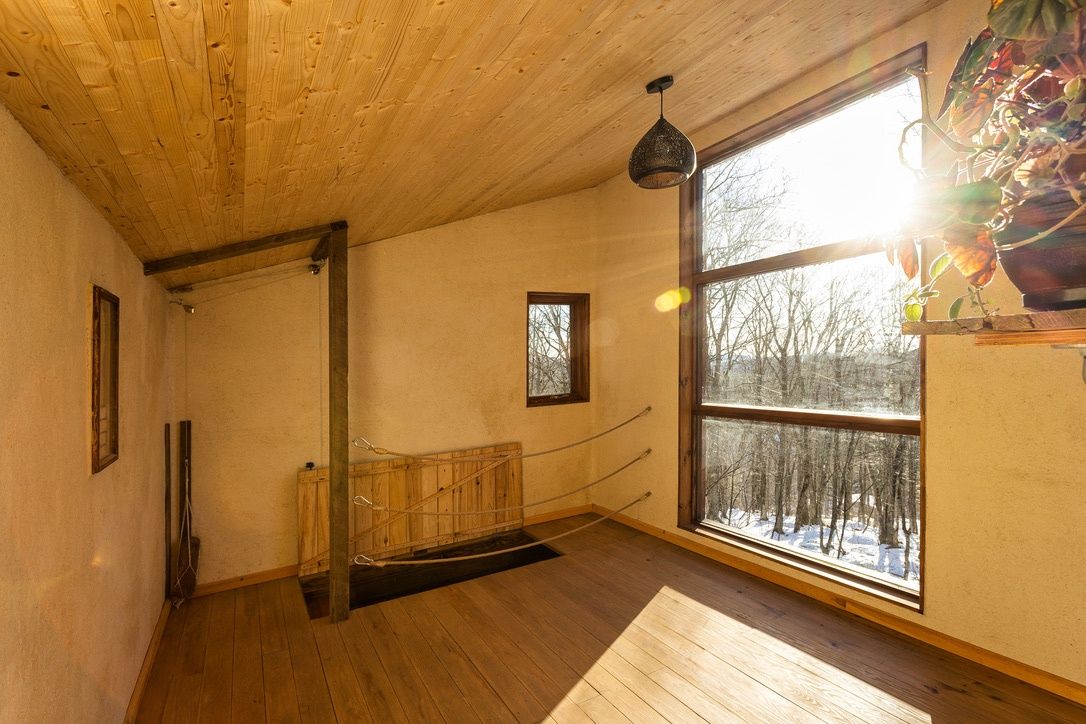 Dormitorio de un proyecto de tipo Ncabados interiores naturales cerca de Ciudad de Quebec - Lévis por BIOPHIL.co