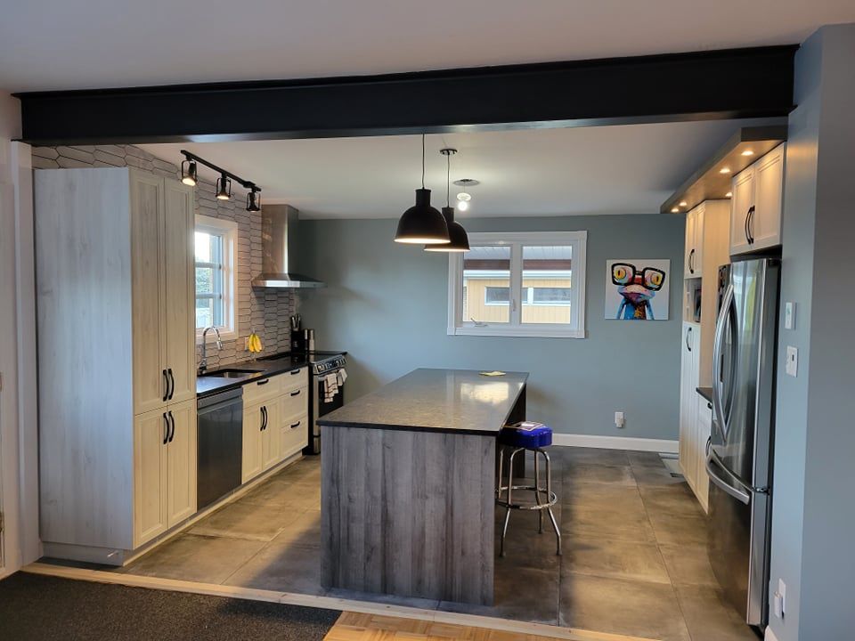 Cocina de un proyecto de tipo Cocinas cerca de Ciudad de Quebec - Lévis por Concept Construction
