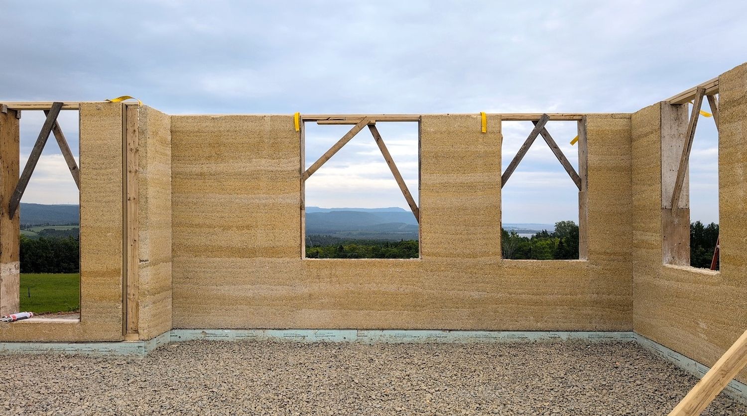Wall Construction from a Single family homes project near Gaspésie - Îles-de-la-Madeleine by atelier vert forêt