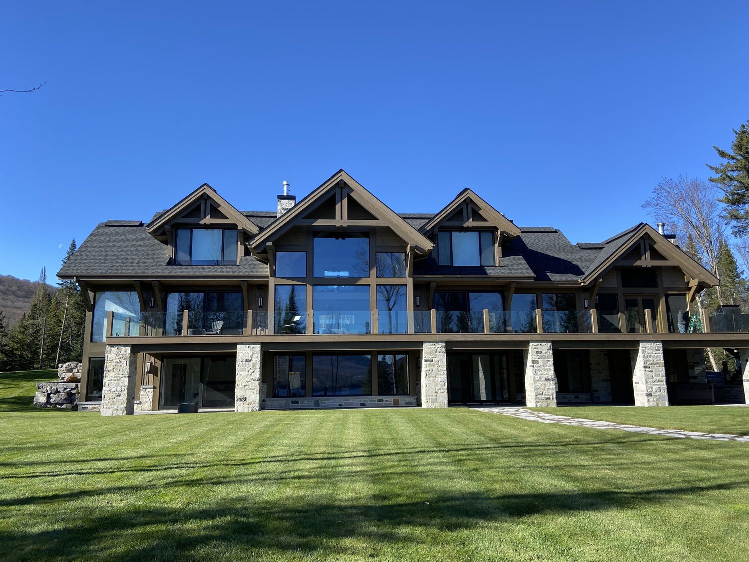 House Exterior from a Solid wood frames project near Montreal (Greater Montreal) by Harkins inc. - Bois rond & Charpenterie