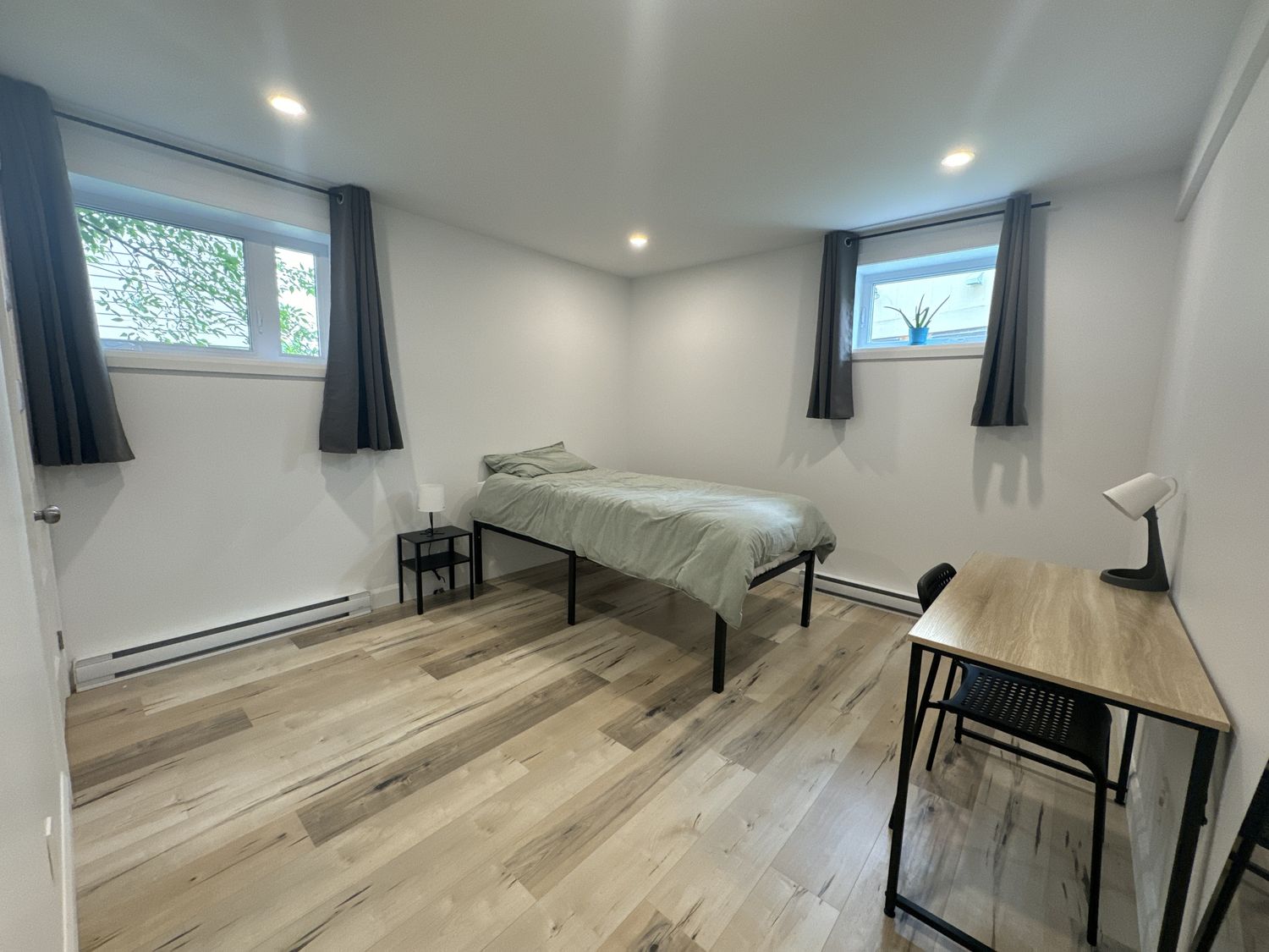 Dormitorio de un proyecto de tipo Edificios de departamentos y rascacielos cerca de Ciudad de Quebec - Lévis por Groupe Habitech