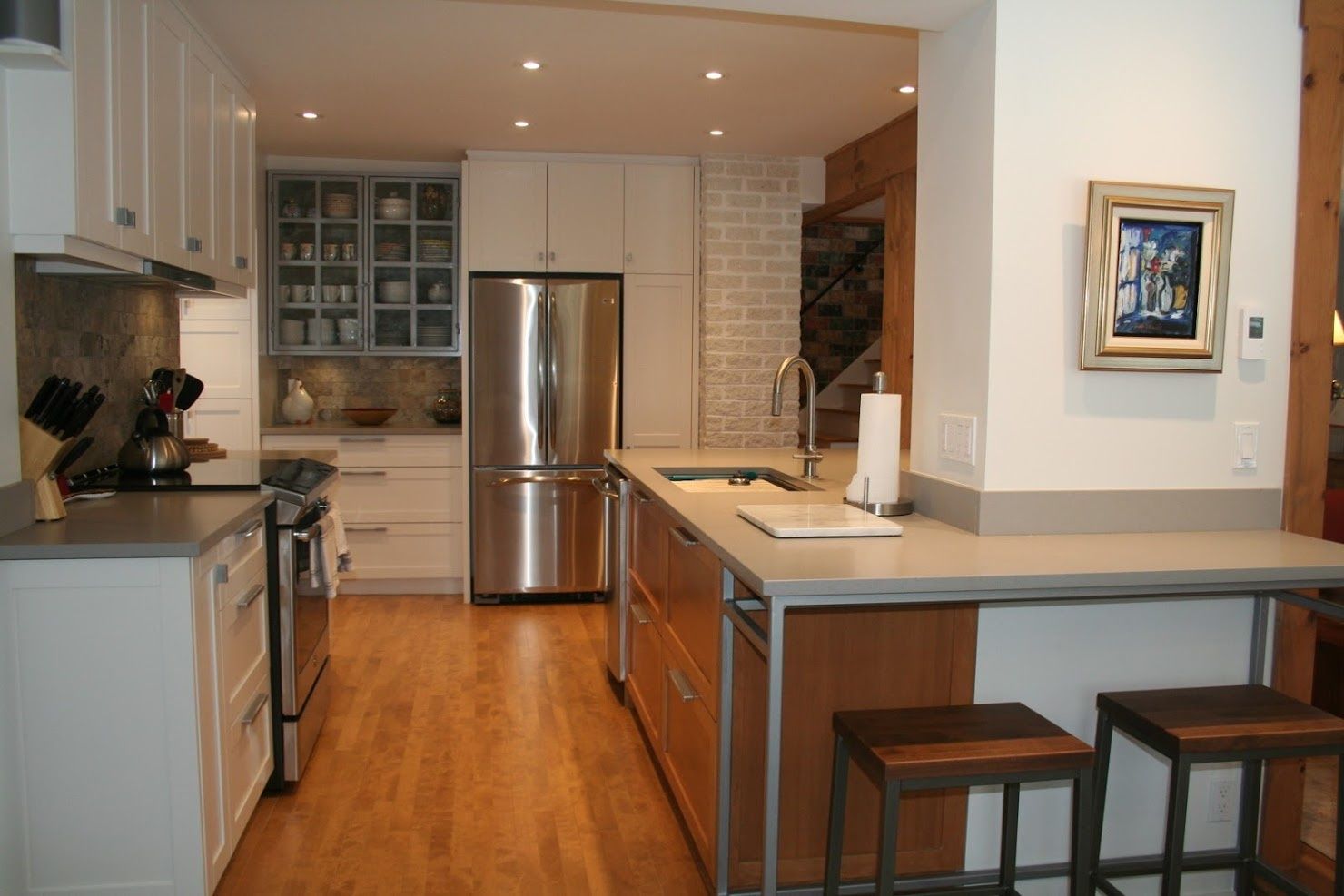 Cocina de un proyecto de tipo Viviendas unifamiliares cerca de Montreal (Gran Montreal) por Ann