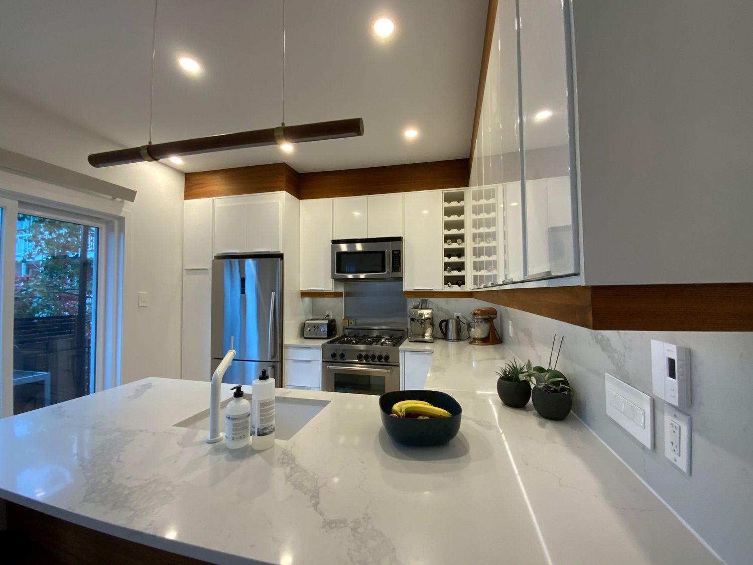 Cocina de un proyecto de tipo Ampliaciones del hogar cerca de Montreal (Gran Montreal) por psb Inc.