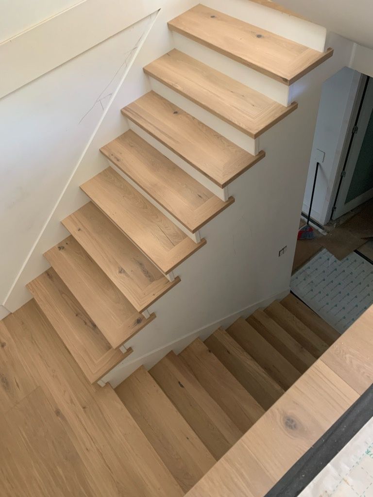 Staircase from a Flooring project near Vancouver (Greater Vancouver) by adanac Floor Covering Inc.