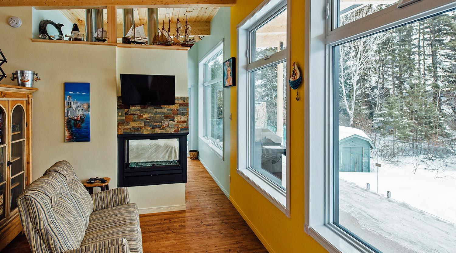 Salle familiale d'un projet de Maisons unifamiliales près de Saguenay/Lac-Saint-Jean de Le Mur Porteur | Coopérative de travail