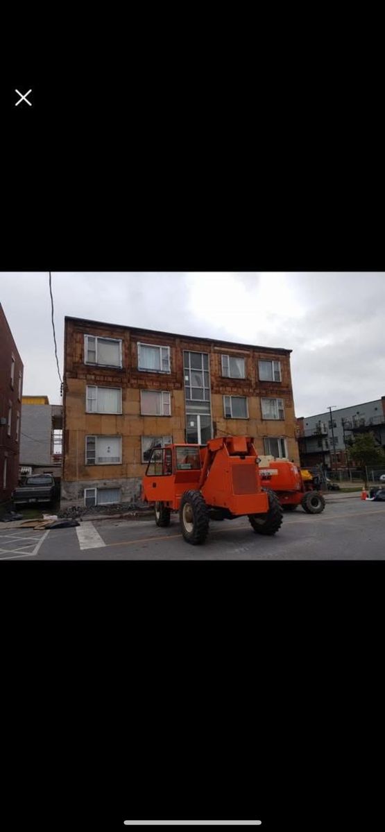 Construcción de exteriores de casas de un proyecto de tipo Muros de ladrillo cerca de Montreal (Gran Montreal) por Trem Construction Inc