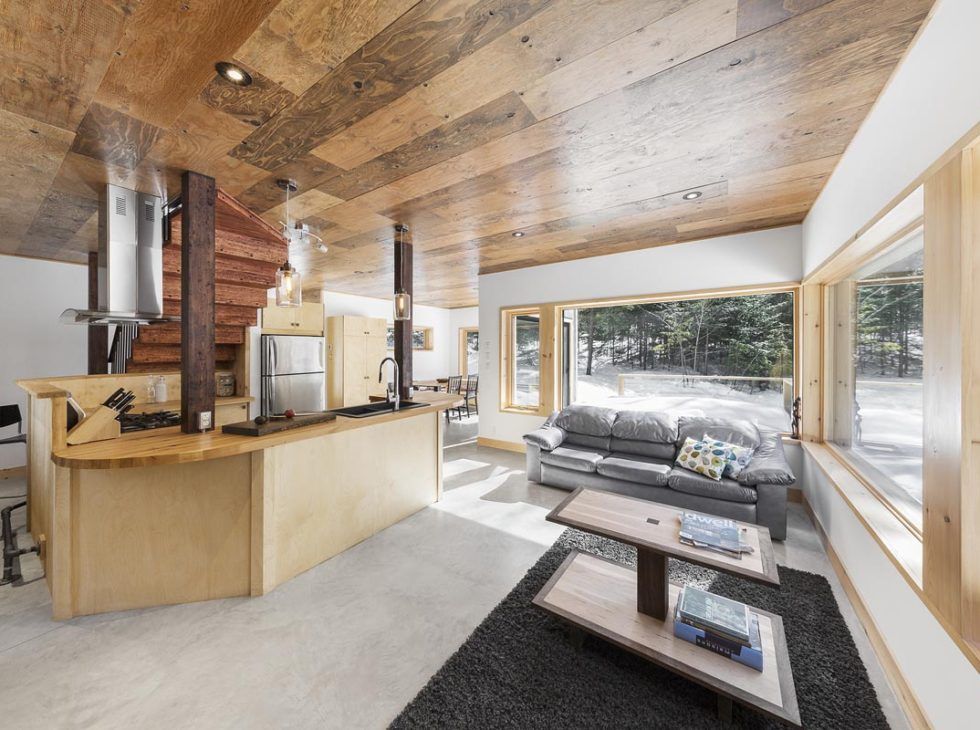 Sala de un proyecto de tipo Viviendas unifamiliares cerca de Saint-Jérôme (Laurentides) por Construction Larix Inc.