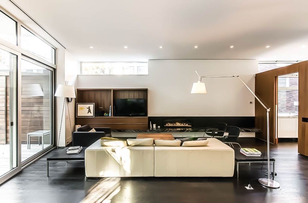 Sala de un proyecto de tipo Condominios, apartamentos cerca de Montreal (Gran Montreal) por Zaraté Lavigne Architectes