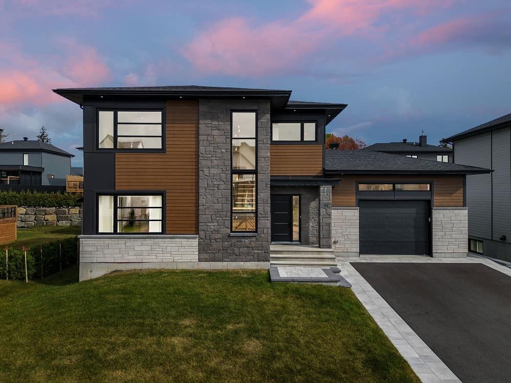Façade avant d'un projet de Fenêtres près de Québec/Lévis (Ville de Québec) de Giguère Portes et Fenêtres Inc.