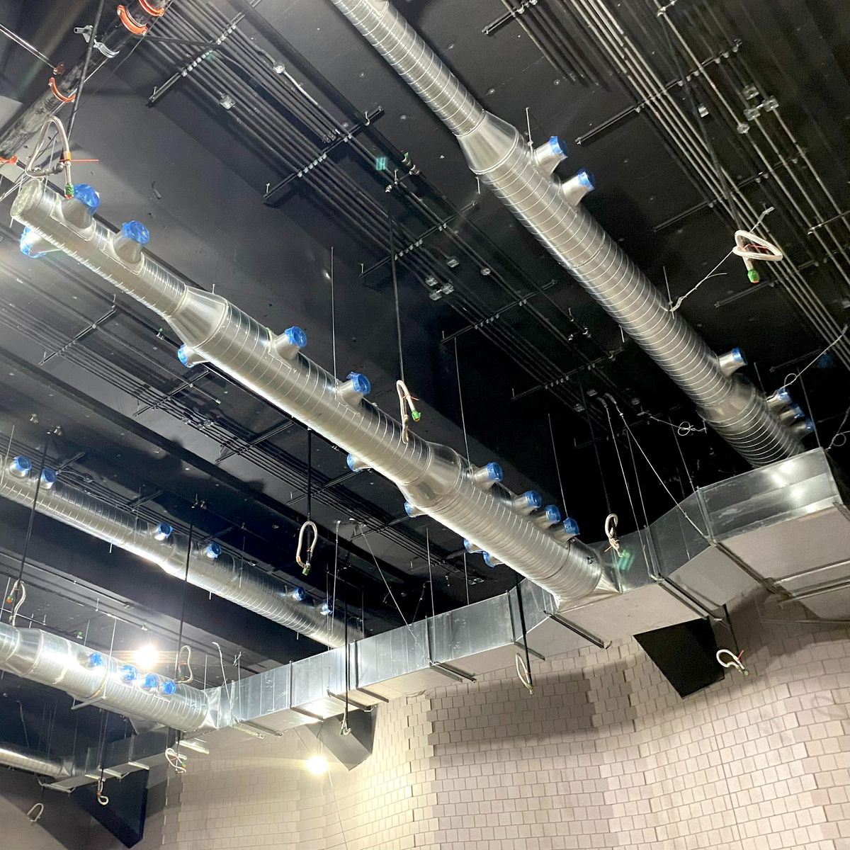 Mécanique du bâtiment d'un projet de Conduits de ventilation près de Montréal/Laval/Longueuil (Grand Montréal) de Les Industries Perform Air