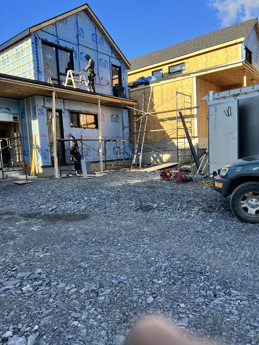 Construcción de exteriores de casas de un proyecto de tipo Condominios, apartamentos cerca de Sherbrooke (Estrie) por Construction Latulippe