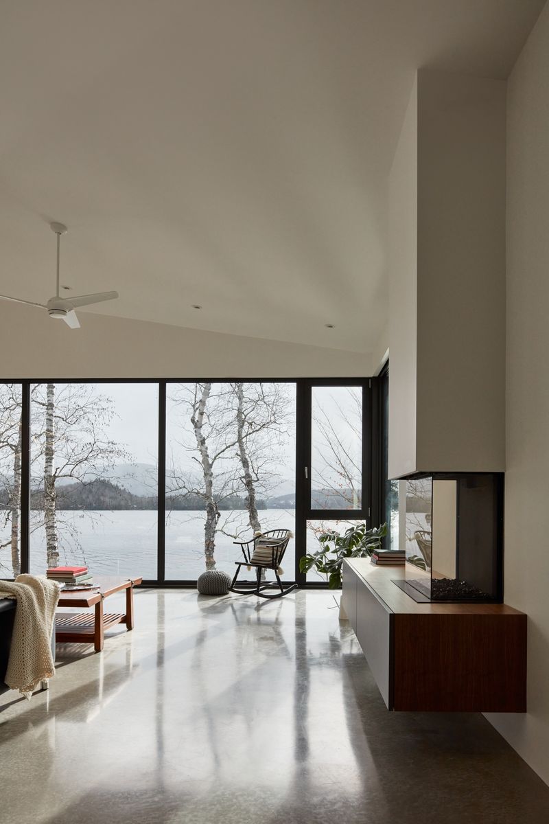 Sala de un proyecto de tipo Viviendas unifamiliares cerca de Montreal (Gran Montreal) por GHOCHE ARCHITECTE